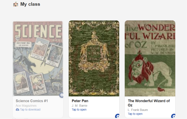 A student's home screen showing the My class shelf with three books shared by the teacher: Science Comics number 1, Peter Pan, and The Wonderful Wizard of Oz, each with its cover and a tap-to-open or tap-to-download label.